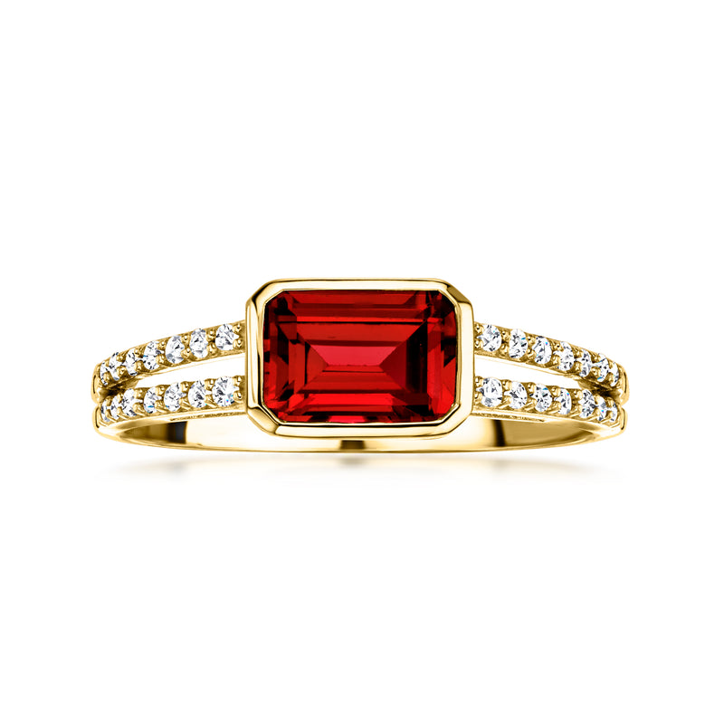 Yellow gold garnet ring with rectangular red stone and diamond split shank