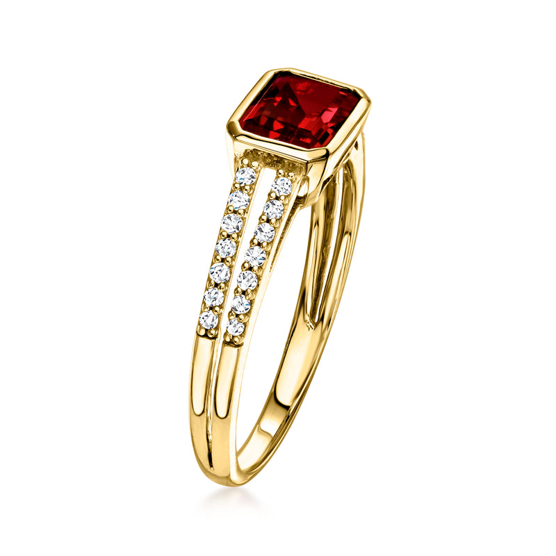 Yellow gold garnet ring with rectangular red stone and diamond accents