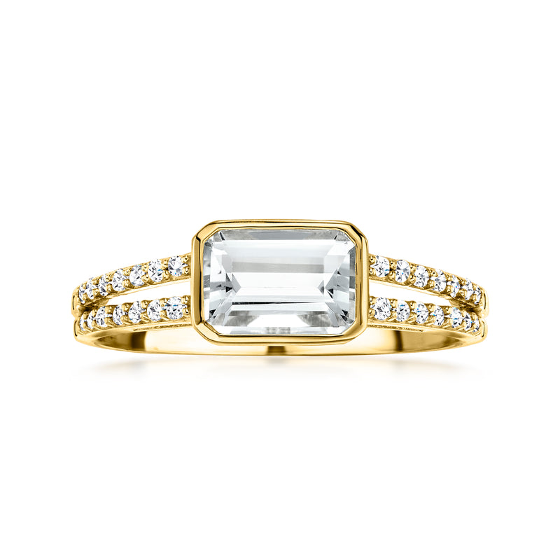 White topaz ring in yellow gold with diamond-accented split shank