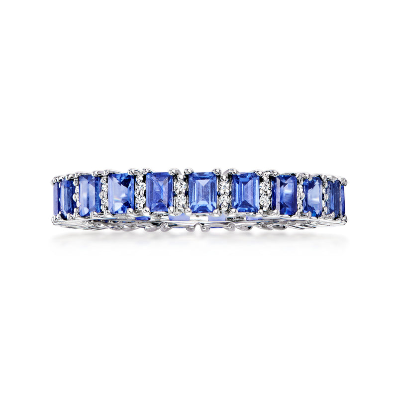 Sapphire eternity band in 14kt white gold with blue baguette stones and diamond accents