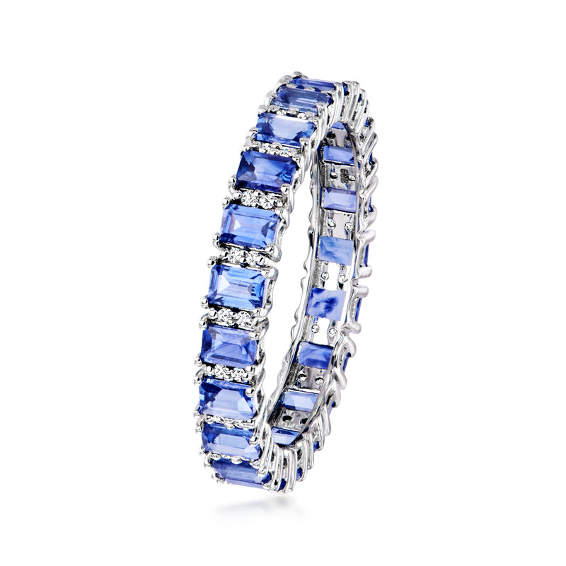 14kt white gold sapphire eternity band with blue baguette stones and side diamond detailing