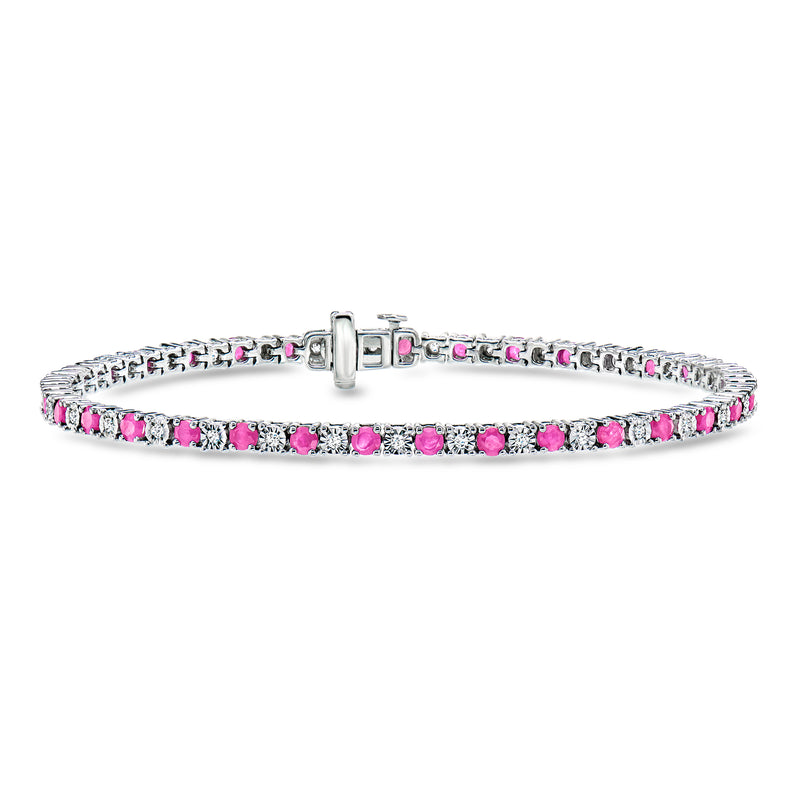Sterling silver tennis bracelet with pink ruby-style stones and small white diamonds