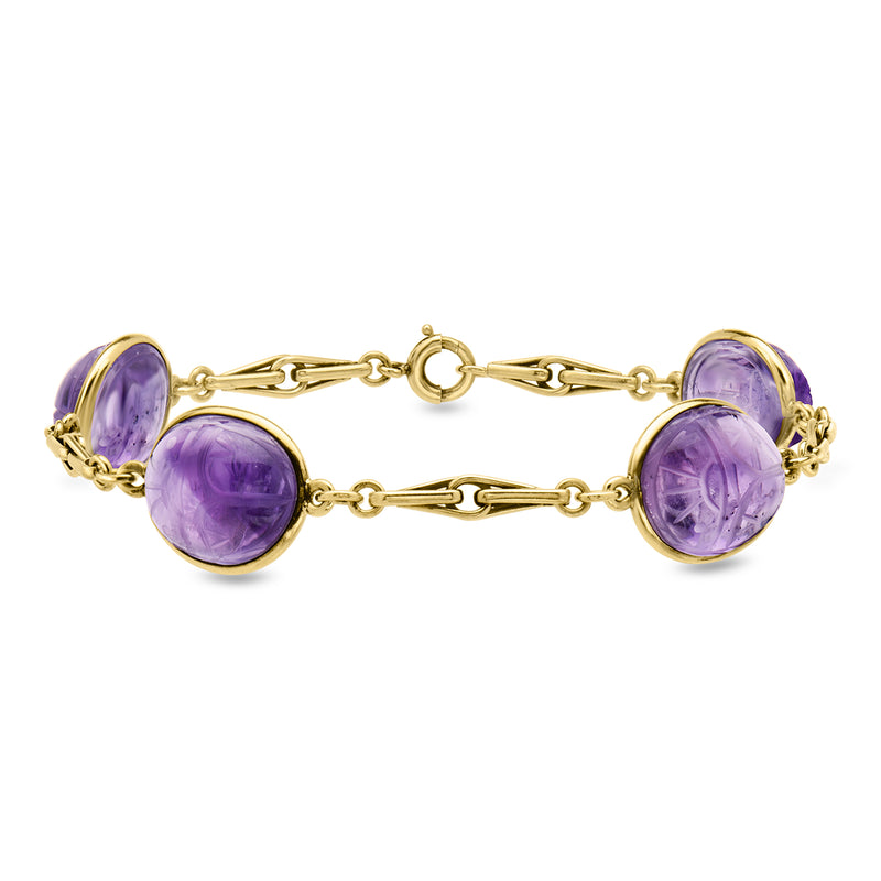 Vintage amethyst bracelet with purple cabochon stones in 14kt yellow gold links