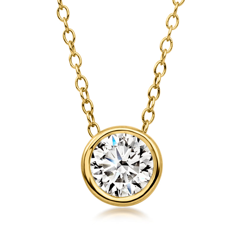Gold solitaire diamond necklace with round bezel-set diamond on 18kt gold chain
