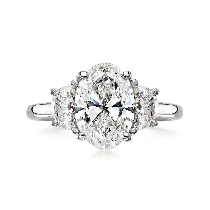 White gold lab-grown diamond ring with large oval center stone and four side stones