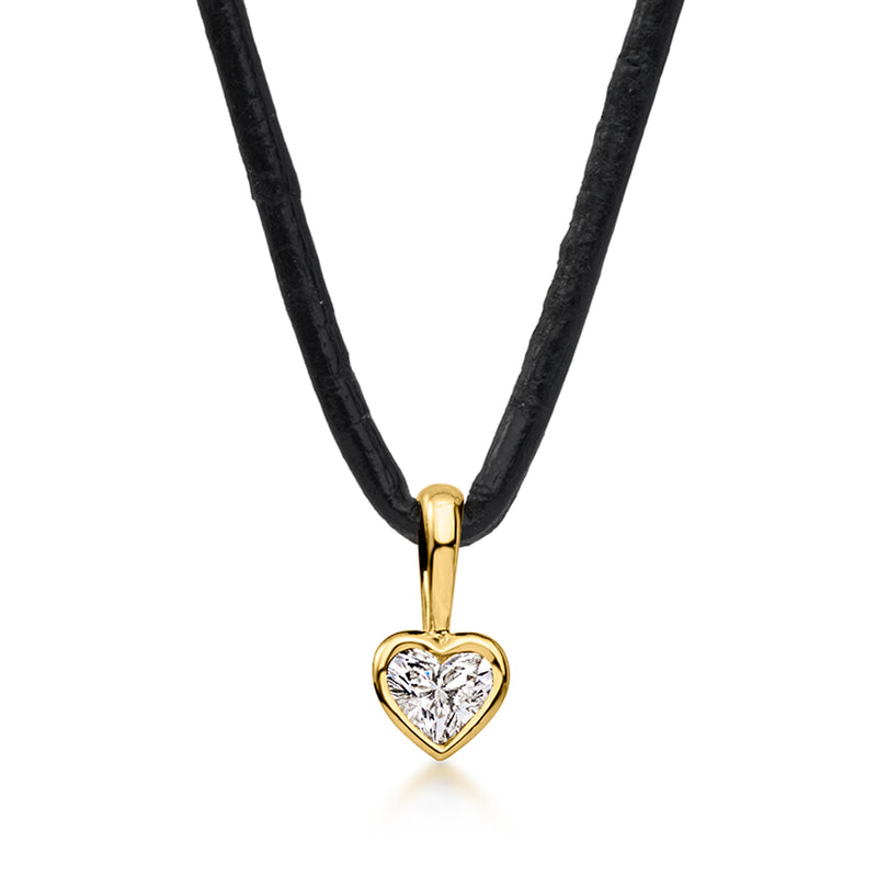 Heart-shaped diamond pendant on black leather cord, gold-tone setting