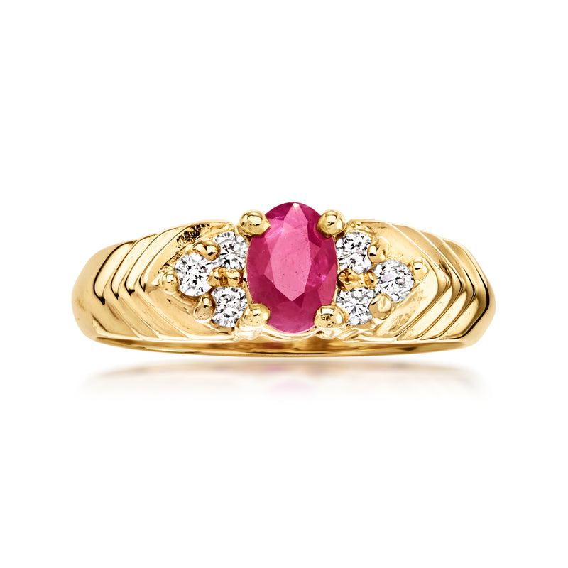 14kt yellow gold vintage ring, oval ruby center with diamond side stones