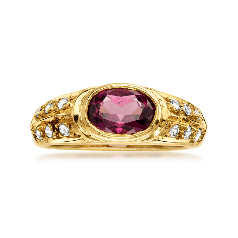 18kt yellow gold ring with oval rhodolite garnet and diamond side accents
