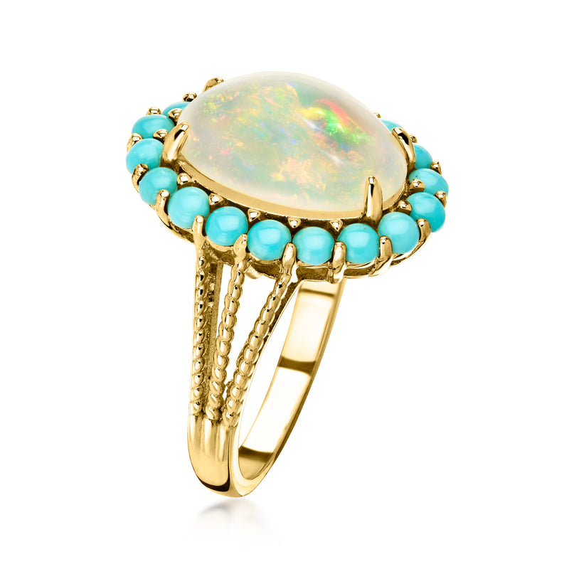 Turquoise bead and oval opal statement ring on gold-tone band, side view