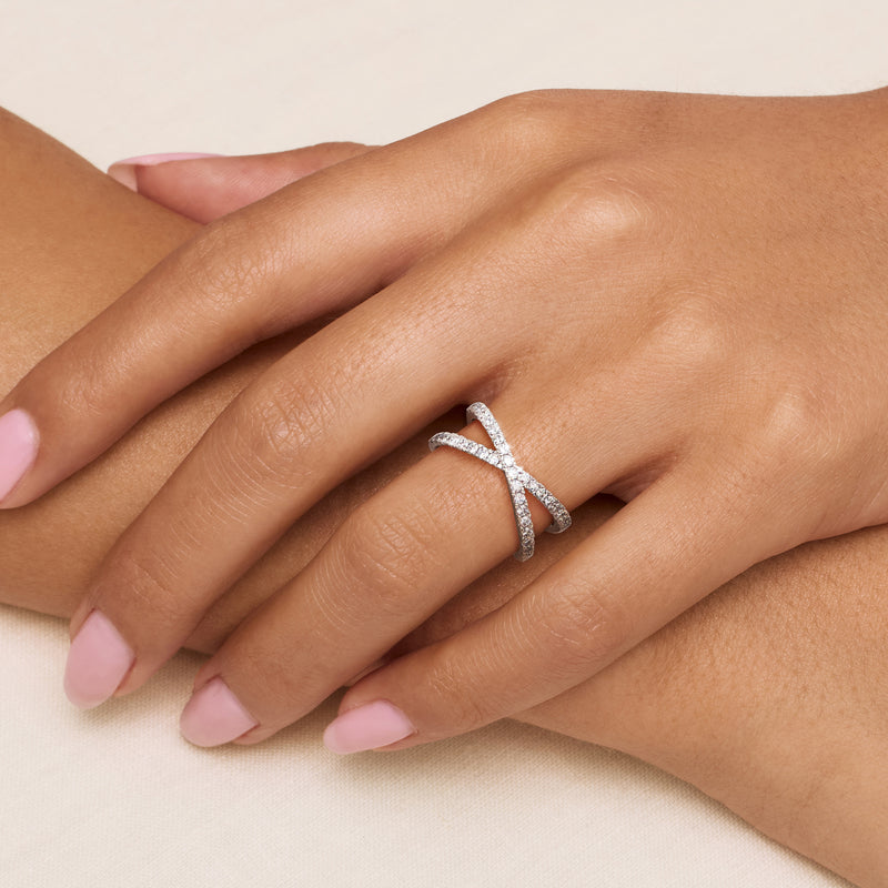 Sterling silver crisscross ring with lab-grown diamonds on the band