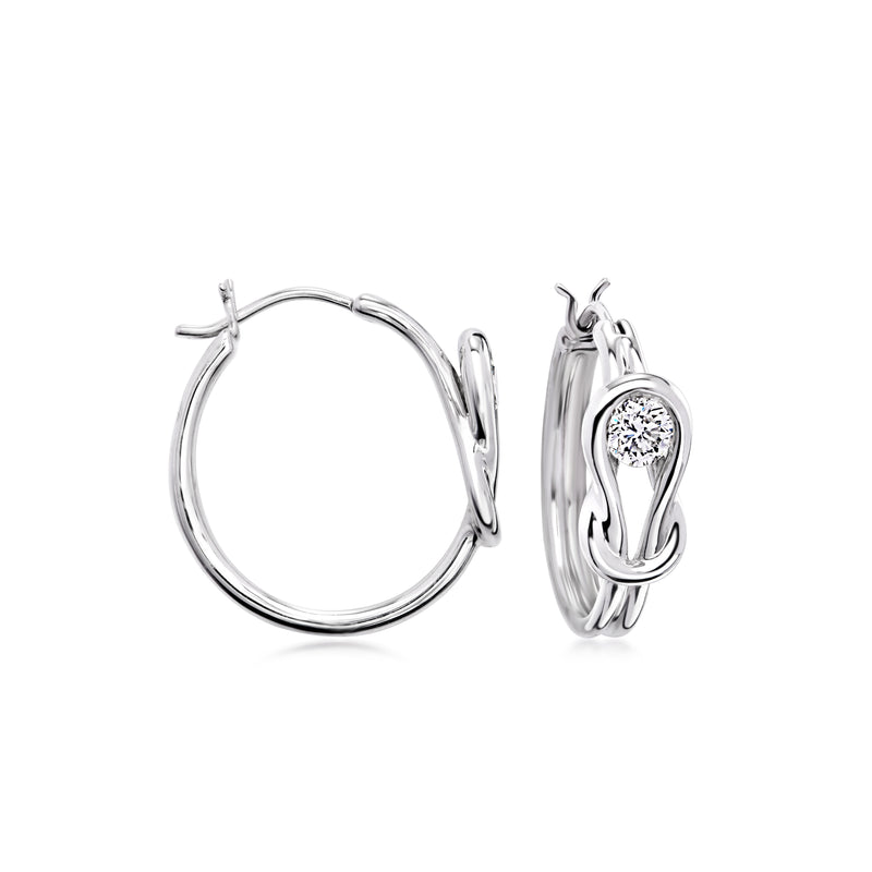 Diamond hoop earrings in 14kt white gold, round center stone on hinged hoops