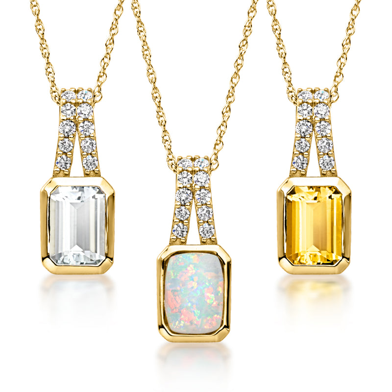 10kt yellow gold birthstone pendant necklace with three gemstone pendants and diamond accents