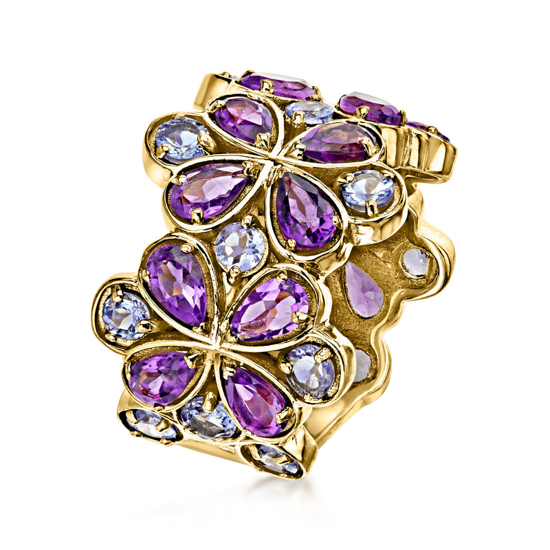 Gold floral cluster ring with purple pear gems and blue round accents on side