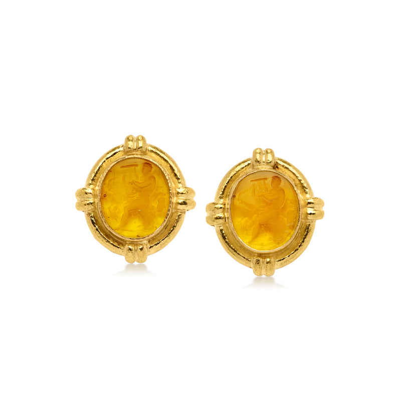 Vintage yellow gold clip/post earrings with oval amber-yellow glass intaglio