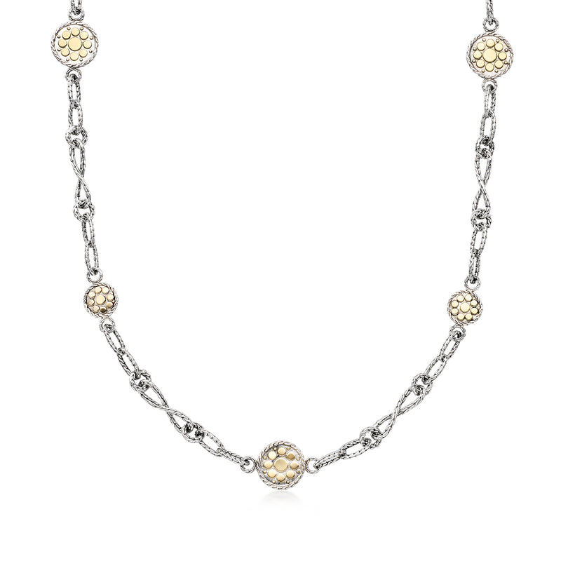 Sterling silver station necklace with dotted-circle rounds and yellow gold accents