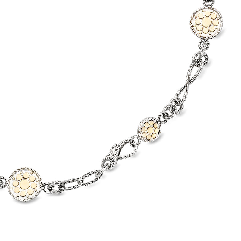 Sterling silver station necklace with linked chain and dotted-circle round stations