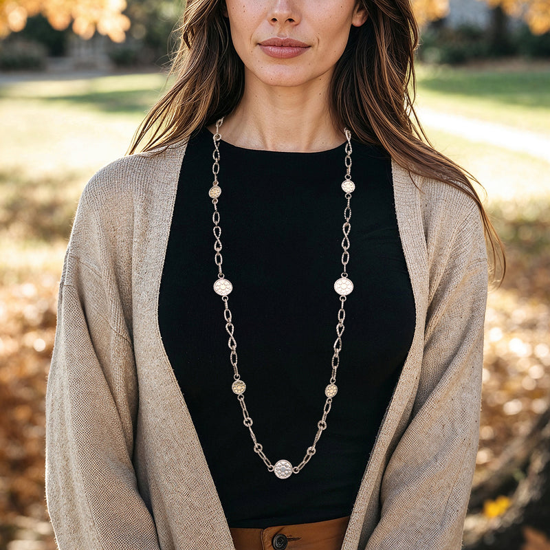 Dotted-circle station necklace with round silver beads and small yellow gold accents