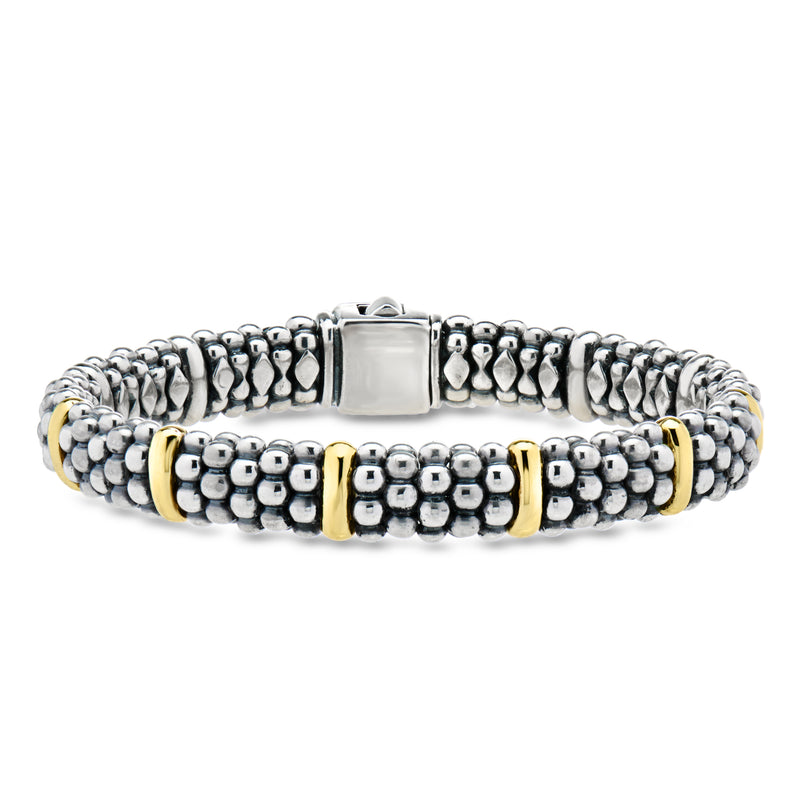 Sterling silver beaded bracelet with yellow gold accents and rectangular center clasp
