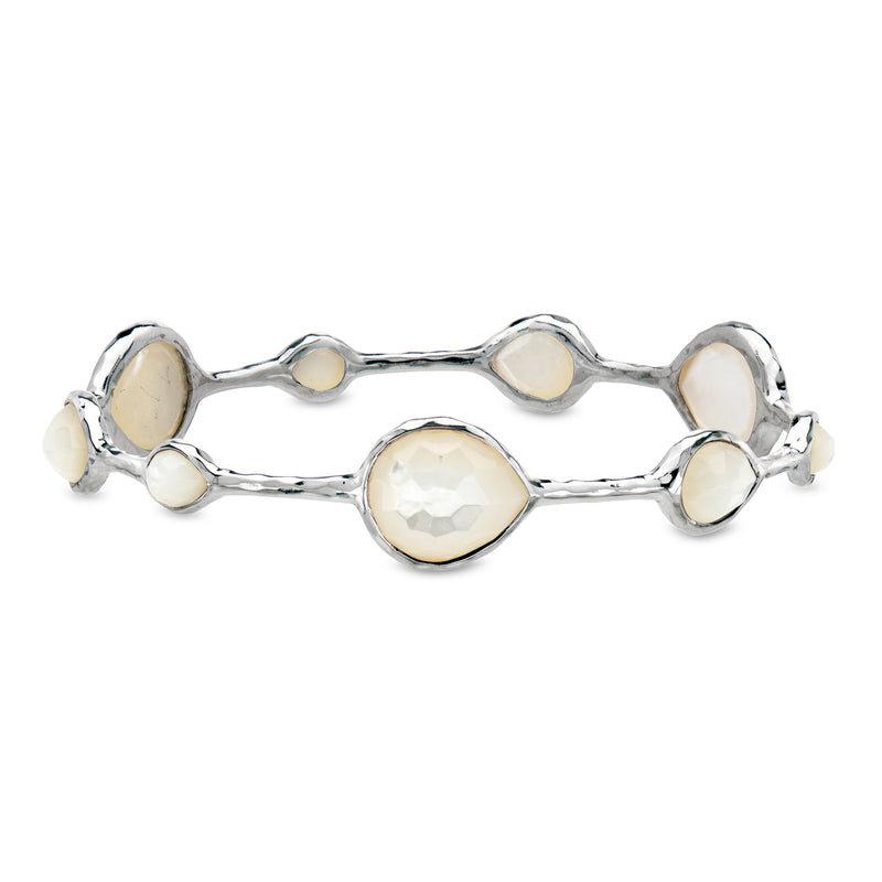 Sterling silver bangle bracelet with mother-of-pearl oval and round stations