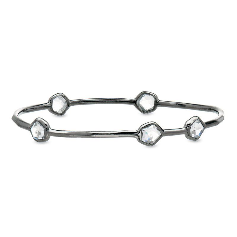 Sterling silver bangle bracelet with five faceted rock crystal station beads