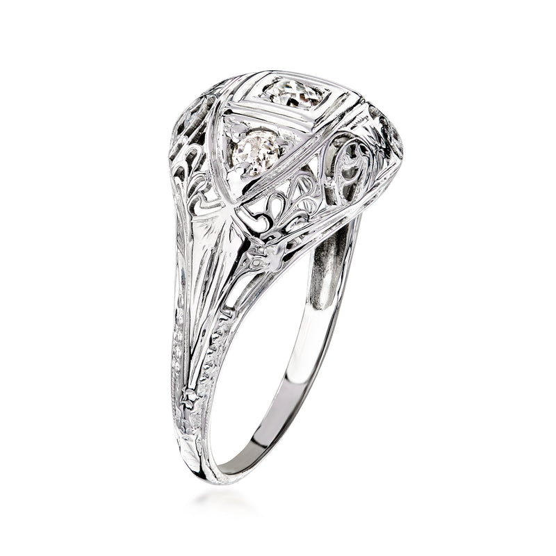 Openwork diamond ring in 18kt white gold, side view with engraved scrollwork details