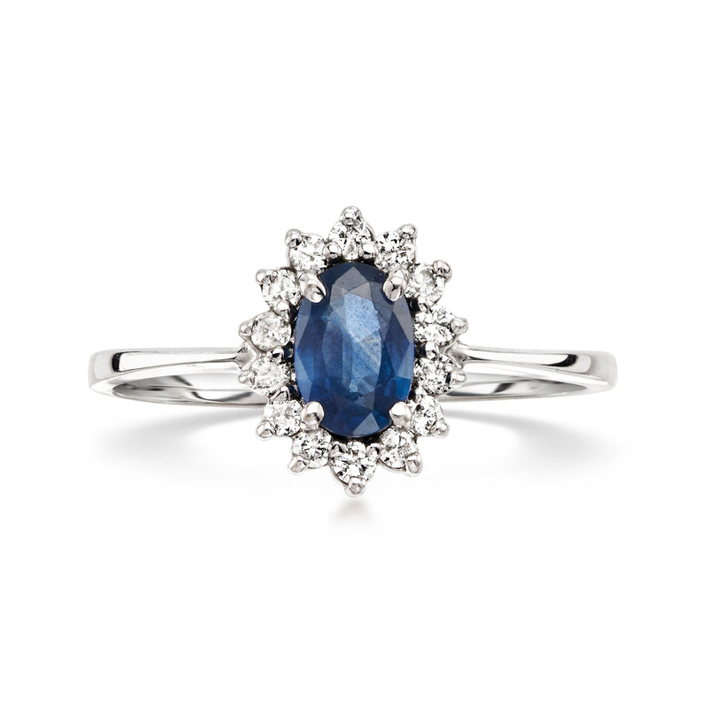 18kt white gold ring with oval blue sapphire and diamond halo