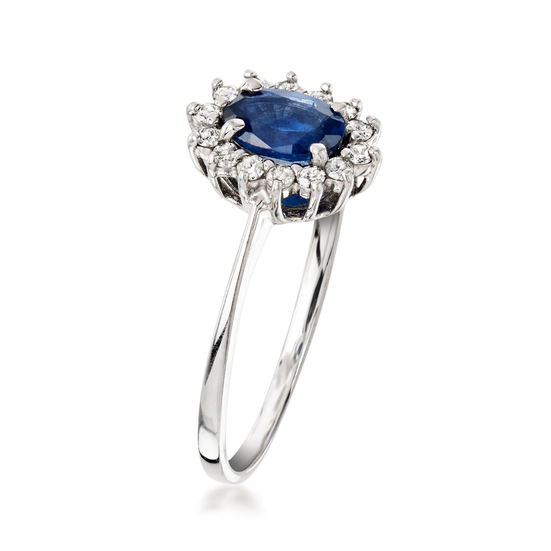 18kt white gold ring with blue oval sapphire center and diamond halo, side view
