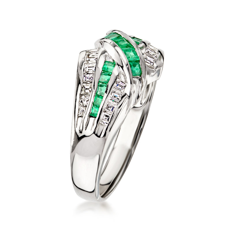 Platinum ring side view with green emerald channel and baguette diamond settings