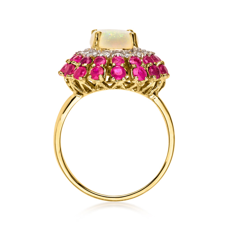 14kt yellow gold opal ring with oval opal and ruby cluster side stones, diamond trim