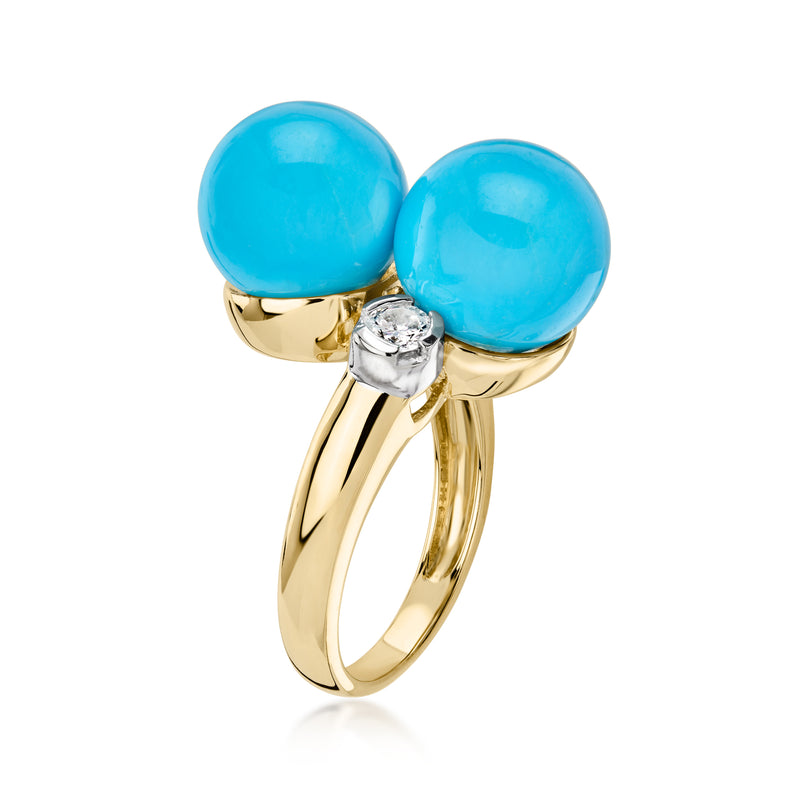 Yellow gold bypass ring with two blue turquoise cabochons and a round diamond accent