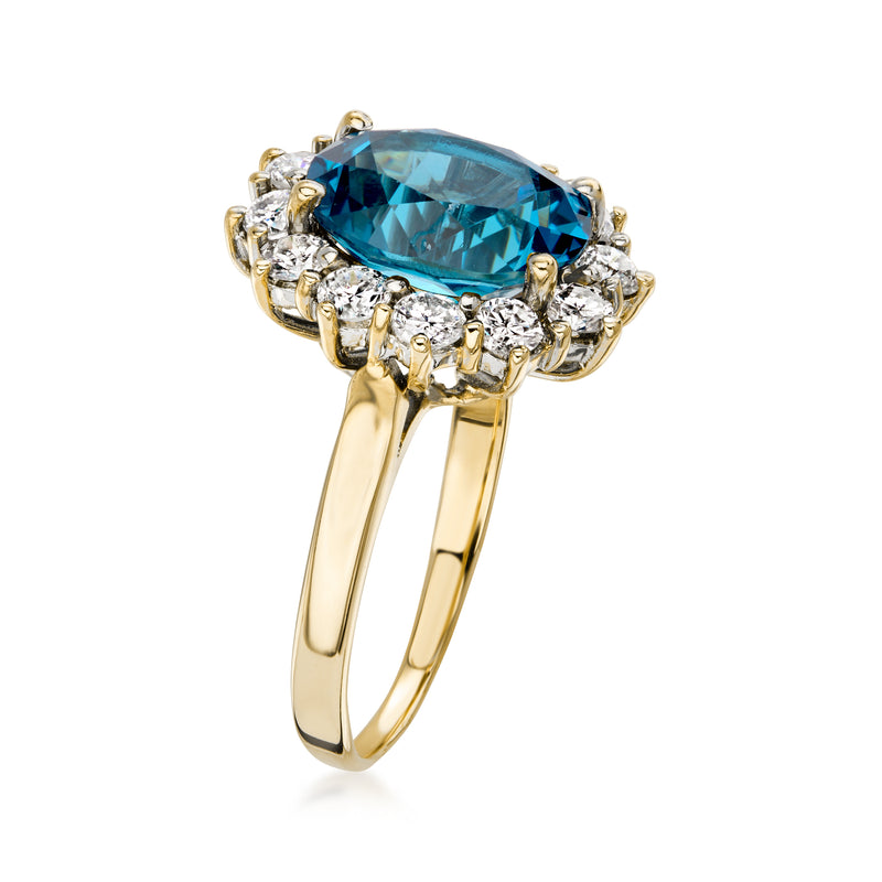 C. 1990 Vintage 4.85 Carat London Blue Topaz and 1.10 ct. t.w. Diamond Ring in 14kt Yellow Gold. Size 7