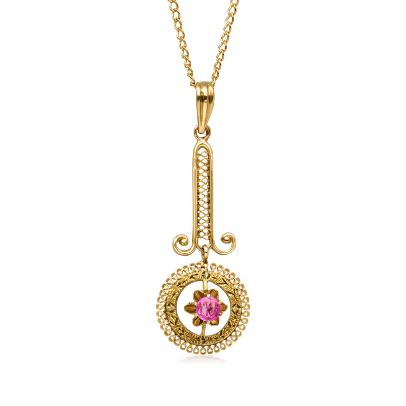 10kt yellow gold pendant necklace with round pink sapphire in gold halo