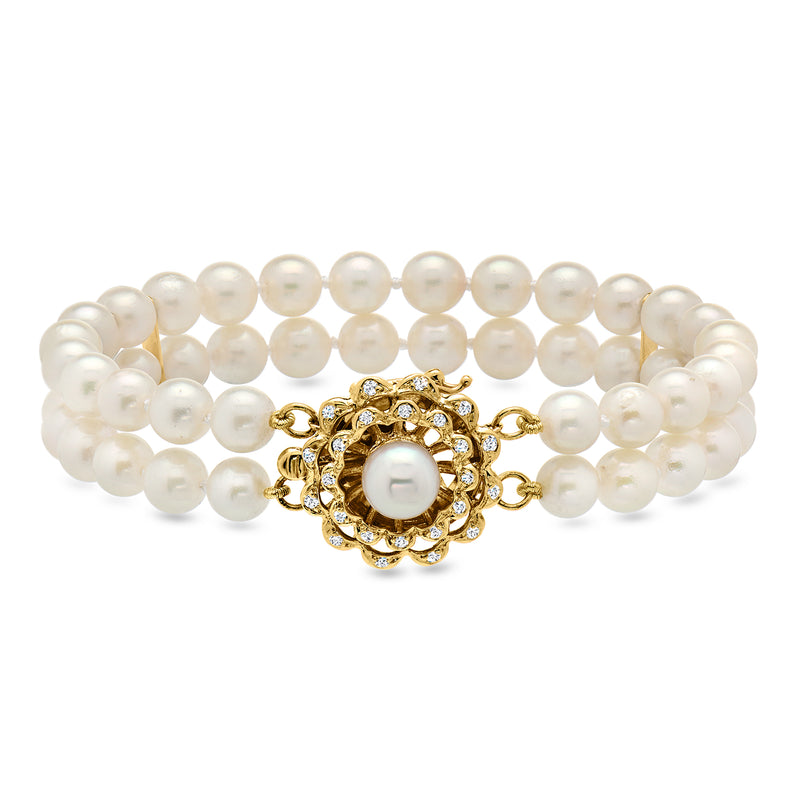 Two-row cultured pearl bracelet with 14kt yellow gold diamond halo clasp