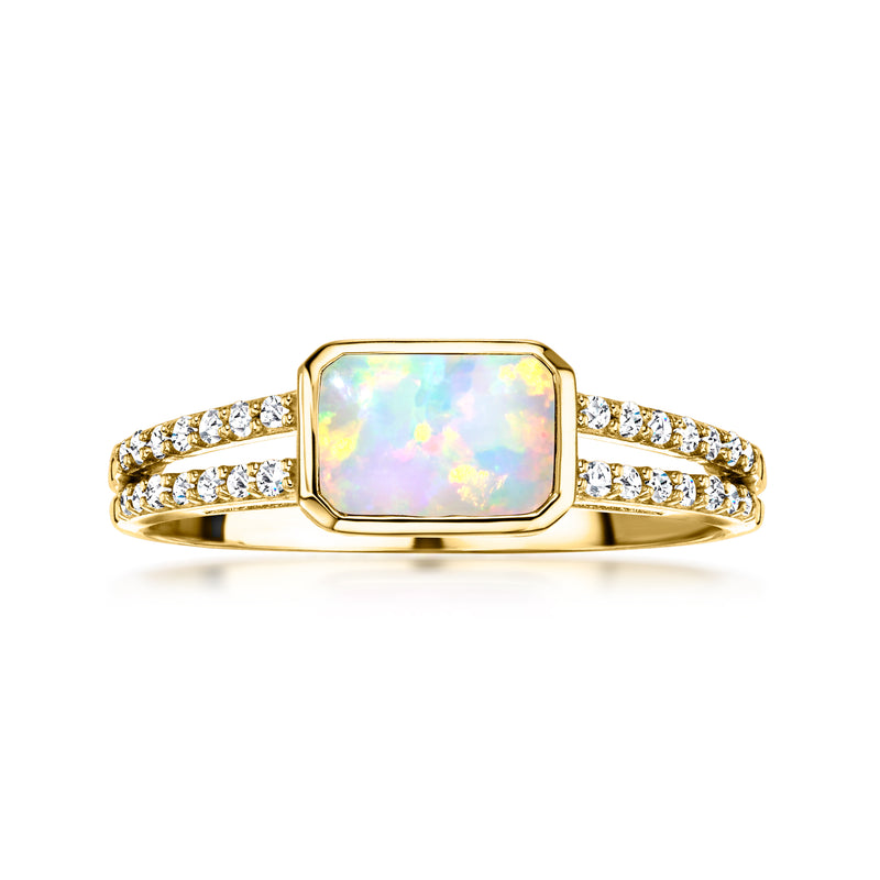 10kt yellow gold ring with iridescent octagon opal and diamond pave shoulders