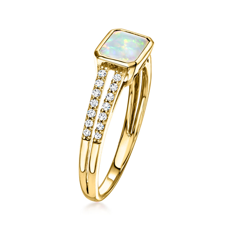 Octagon opal ring in 10kt yellow gold with diamond inset side bands