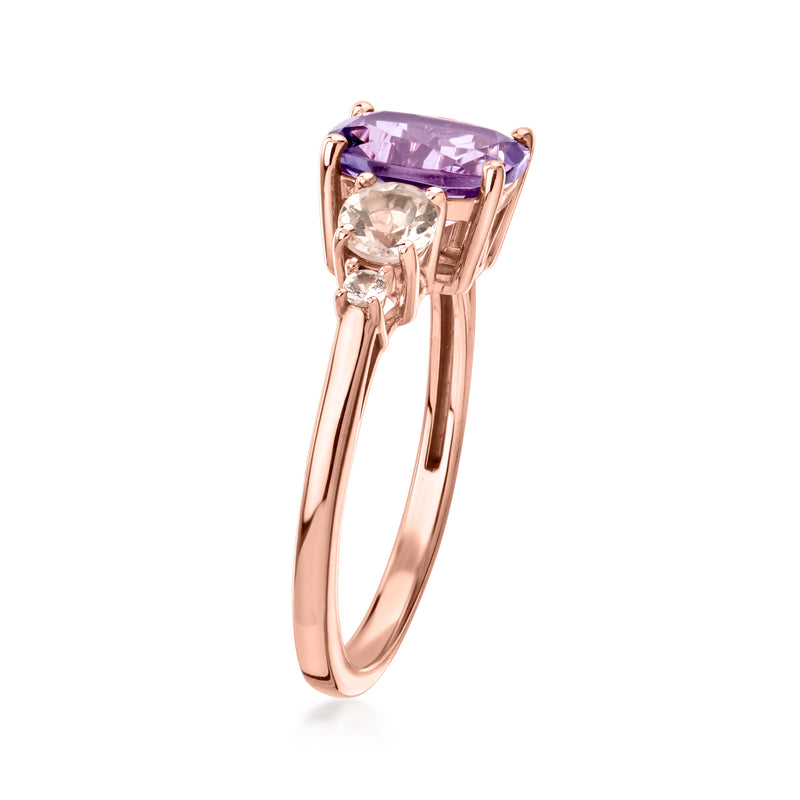 Rose gold oval amethyst ring with four prong setting and white stone accents