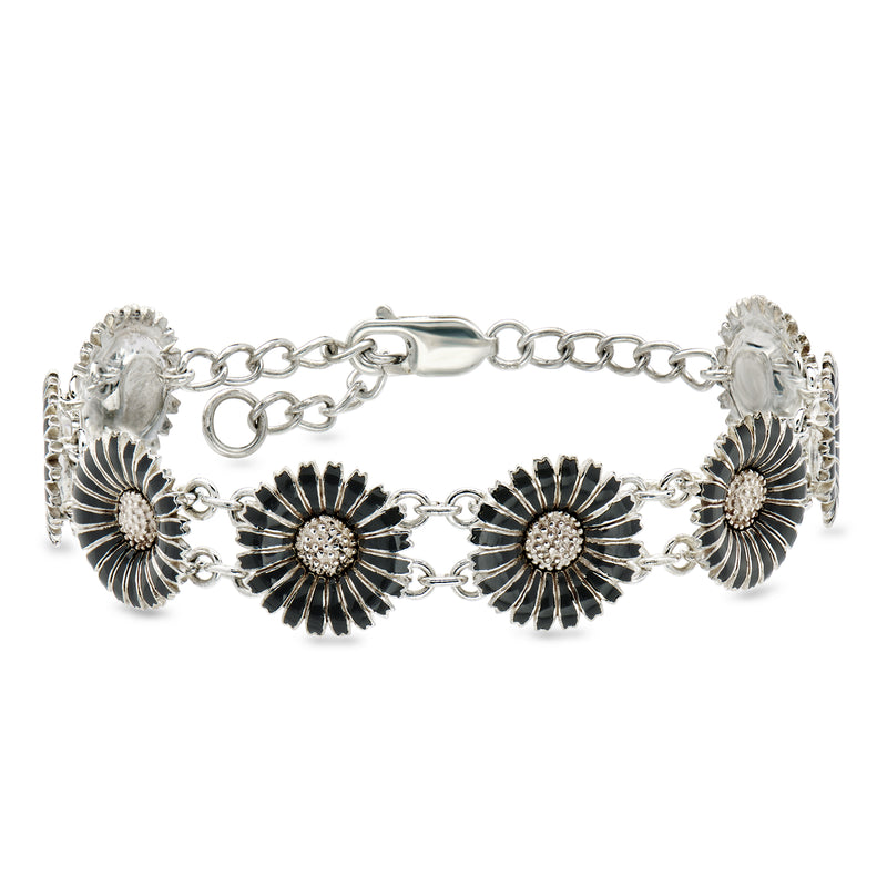 Sterling silver flower bracelet with black enamel, linked chain and round floral medallions