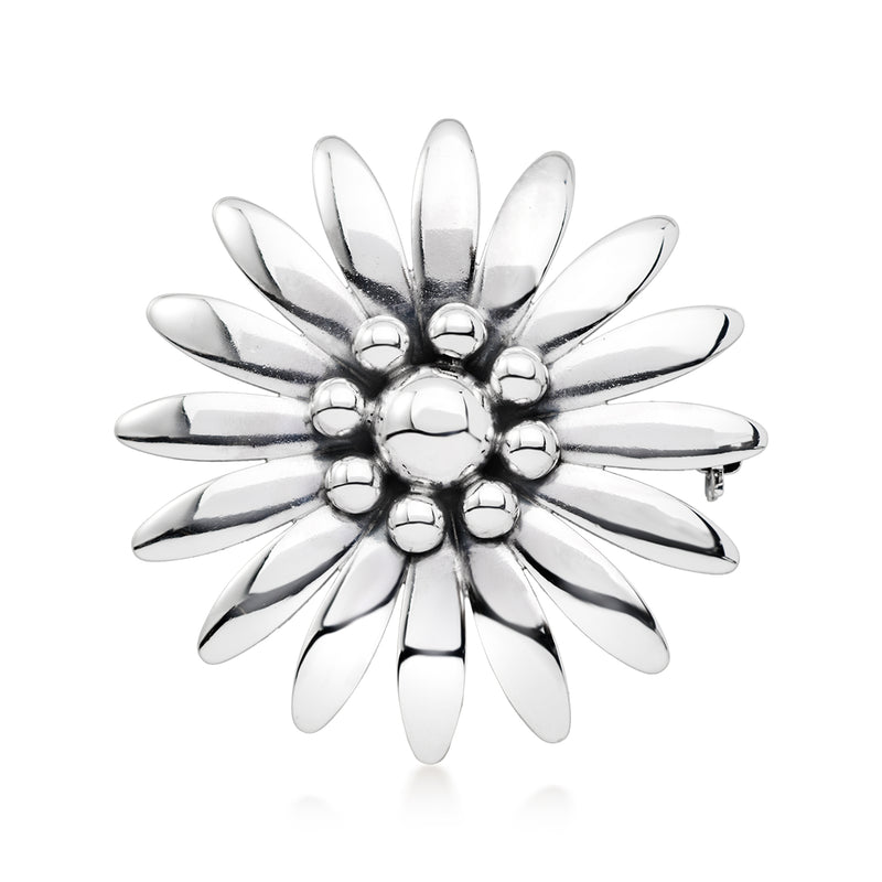 Vintage sterling silver flower pin with raised petal design and round bead centers