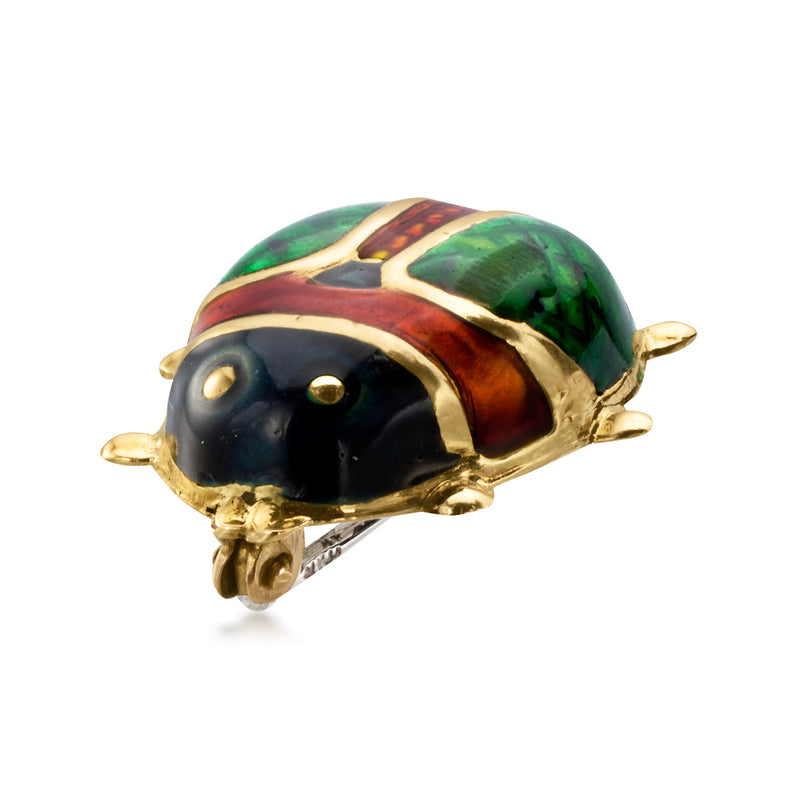 Gold-tone enamel beetle pin, side view with green shell and black wing sections