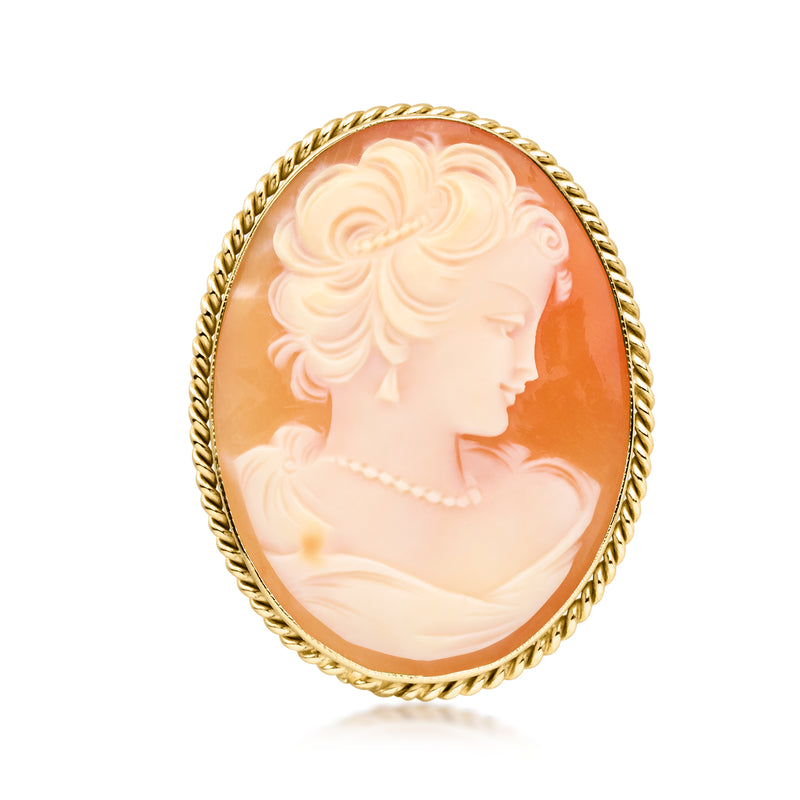 Vintage orange shell cameo pin in 10kt yellow gold oval frame, profile woman relief