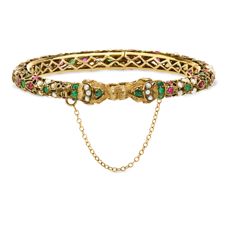 Gold bangle with lattice pattern, multicolor gems, pearl accents, and hanging chain