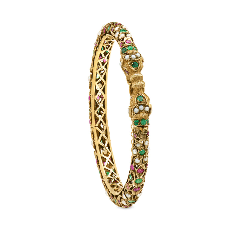 Gold lattice bangle with elephant-head end, multicolor gems, and pearl details