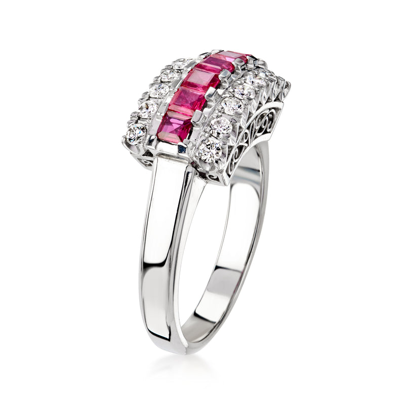 Platinum vintage ruby and diamond ring, angled side view with pink center stones