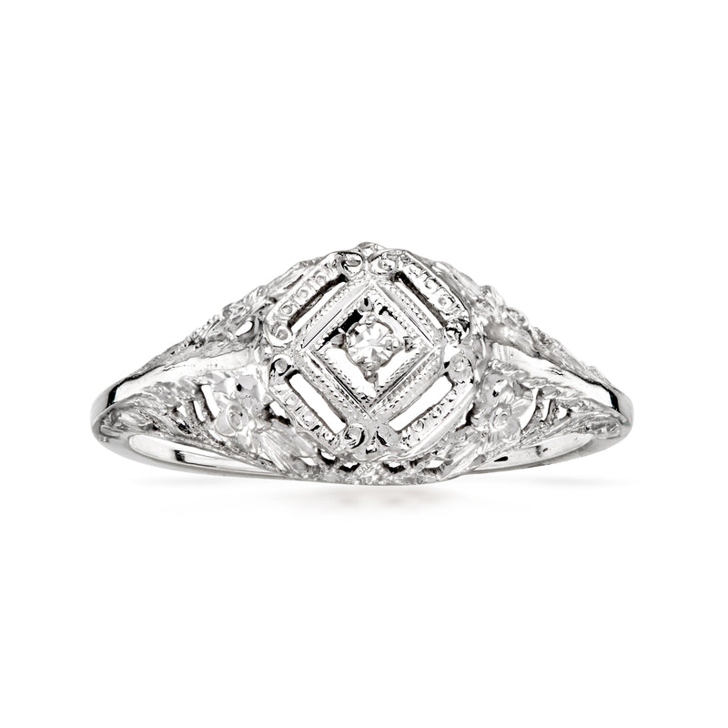 Vintage 10K white gold filigree ring with single diamond center