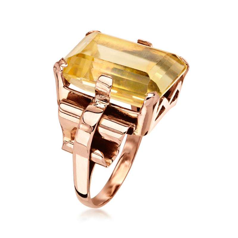 Rose gold ring with rectangular yellow citrine gemstone, side view of prongs and band