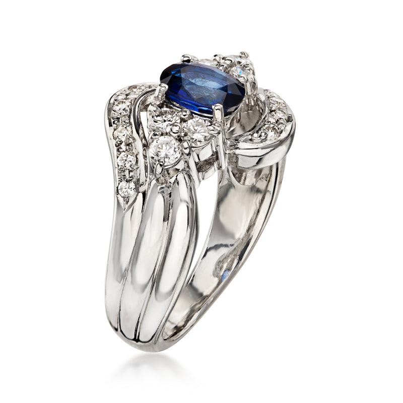 C. 1990 Vintage .63 Carat Sapphire Swirl Ring with .37 ct. t.w. Diamonds in Platinum. Size 5