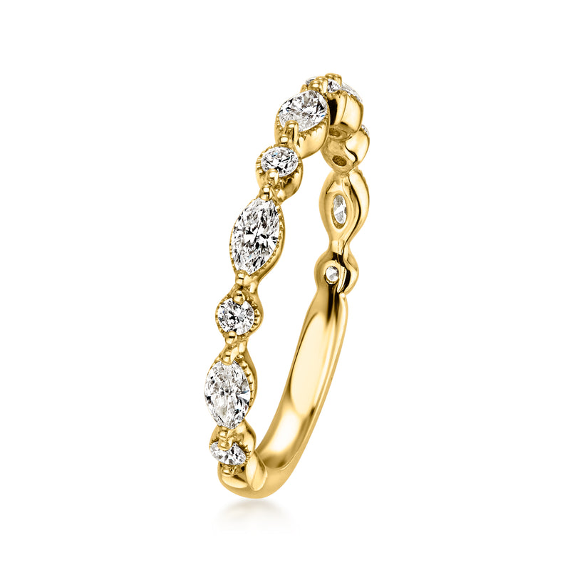 Yellow gold diamond ring side view with linked oval-cut stones in bezels