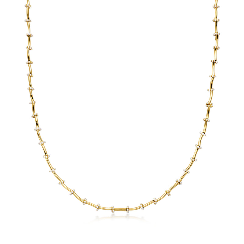 Gold-filled fancy-link chain necklace with polished clasp and small bead accents