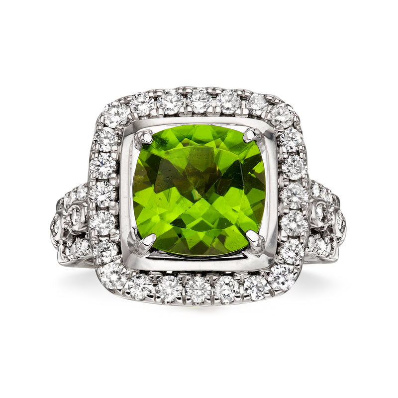 Vintage peridot ring in 14k white gold with square green gemstone and diamond halo