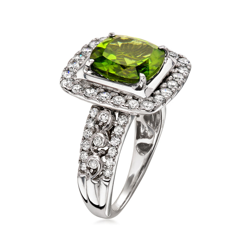 Peridot ring with diamond halo and split-shank band in white gold